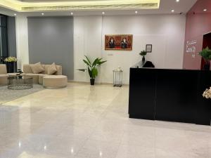 a lobby with a reception desk in a building at Express City Hotel - Duqm in Duqm