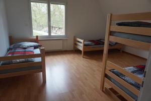 a room with two bunk beds and a window at Ferienwohnung am Rhein in Stein