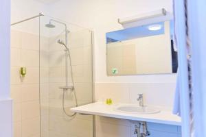 Kúpeľňa v ubytovaní Ferienhotel Alber
