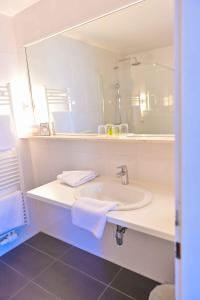 Kúpeľňa v ubytovaní Ferienhotel Alber