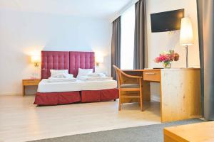 Posteľ alebo postele v izbe v ubytovaní Ferienhotel Alber