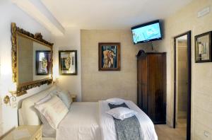 Postel nebo postele na pokoji v ubytování B&B GianLuis