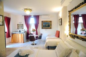 Postel nebo postele na pokoji v ubytování B&B GianLuis