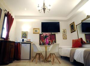 TV a/nebo společenská místnost v ubytování B&B GianLuis