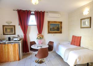 Postel nebo postele na pokoji v ubytování B&B GianLuis