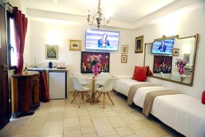 Postel nebo postele na pokoji v ubytování B&B GianLuis