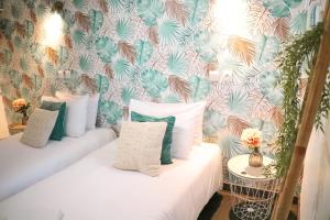Postel nebo postele na pokoji v ubytování Maria Grazia Hotel