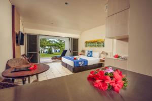 Postel nebo postele na pokoji v ubytování Sunset Resort + 37 fotografií