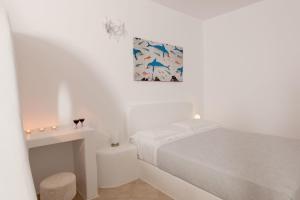 Postel nebo postele na pokoji v ubytování Katharos Pool Villas