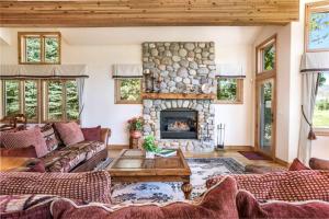 a living room with a couch and a fireplace at Arrowhead Drive 179-W in Edwards