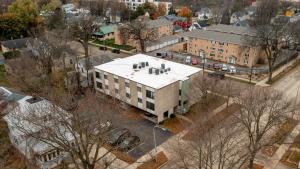 an overhead view of a building in a city at Modern 2 Bed/1 Bath, In-Unit Laundry, Parking + 6 Blocks from Mayo in Rochester