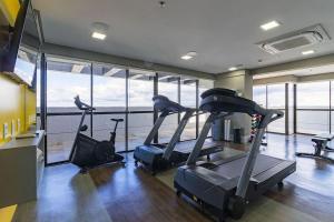 Fitness centrum a/nebo fitness zařízení v ubytování Apartamento confortável, ótima localização