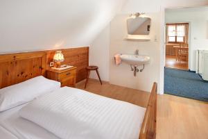 Ένα ή περισσότερα κρεβάτια σε δωμάτιο στο Abenteuerhof