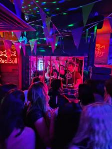 a group of people sitting in a club at BunkHouse in Cardiff