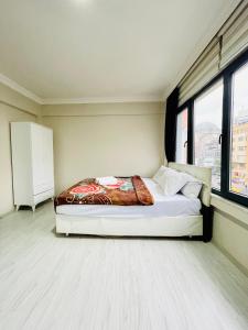 A bed or beds in a room at Apart 71