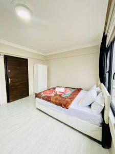 A bed or beds in a room at Apart 71