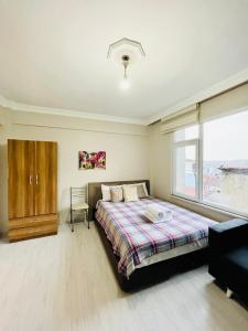 A bed or beds in a room at Apart 71