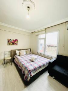 A bed or beds in a room at Apart 71