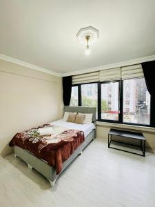 A bed or beds in a room at Apart 71