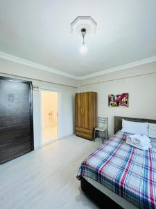 A bed or beds in a room at Apart 71