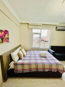 A bed or beds in a room at Apart 71