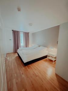 Letto o letti in una camera di Gamli Skólinn Húsavík