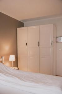 Letto o letti in una camera di Gamli Skólinn Húsavík