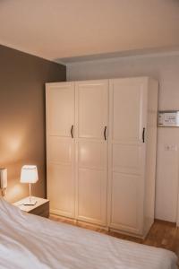 Letto o letti in una camera di Gamli Skólinn Húsavík