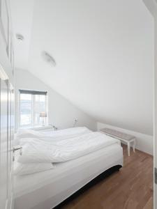 Letto o letti in una camera di Gamli Skólinn Húsavík
