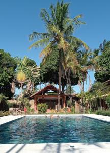 Der Swimmingpool an oder in der Nähe von Machê Pousada & Boutique - A mais charmosa de Arraial D ajuda