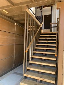 a set of stairs in a building with a door at Departamento central Copiapó in Copiapó