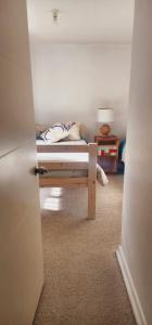 a bedroom with a bed in a room at Departamento 2d1b Puerto Varas in Puerto Varas