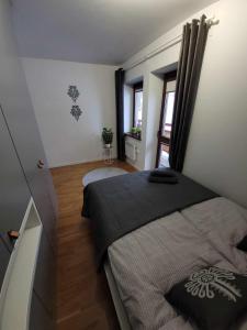 Posteľ alebo postele v izbe v ubytovaní Apartament Pod Brzyzkiem & Spa