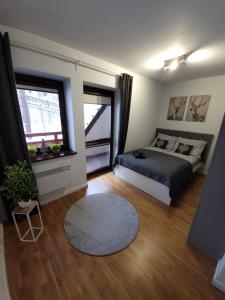 Posteľ alebo postele v izbe v ubytovaní Apartament Pod Brzyzkiem & Spa