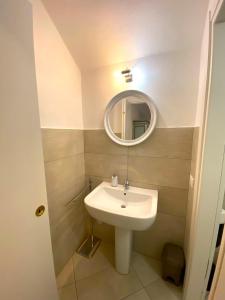 a bathroom with a sink and a mirror at Villa Silvana in Perledo +147 photos