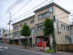 a building on the side of a city street at Minshuku Suzu - Vacation STAY 21226v in Shimanto