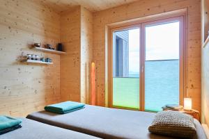 Llit o llits en una habitació de Naturferienwohnung Weitsicht