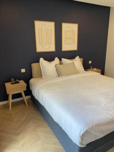 Ένα ή περισσότερα κρεβάτια σε δωμάτιο στο Maison spacieuse au calme proche Colmar avec piscine +47 φωτογραφίες