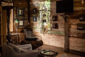 Uma TV ou centro de entretenimento em Serra do Ibitipoca Hotel de Lazer