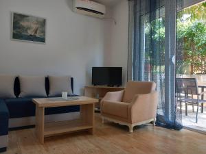 Posezení v ubytování Apartman Gačić + 13 fotografií