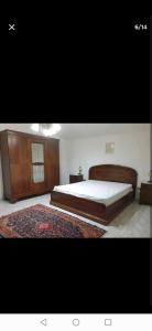 Ein Bett oder Betten in einem Zimmer der Unterkunft Appartamento L'Oleandro B&B