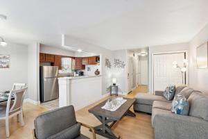 a living room with a couch and a table at Philadelphia Vacation Rental Near Public Transit! in Philadelphia