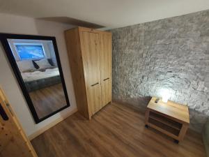 Posteľ alebo postele v izbe v ubytovaní Apartament z jacuzzi Zakopane