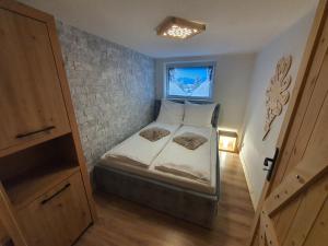 Posteľ alebo postele v izbe v ubytovaní Apartament z jacuzzi Zakopane