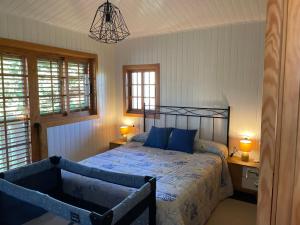 A bed or beds in a room at A Leira