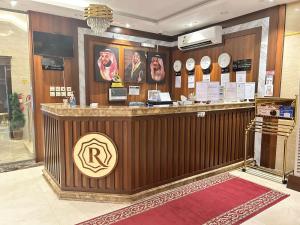 a restaurant with a bar with a sign on it at شقق ريجنسي للشقق المخدومة in Jazan