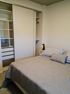 Postel nebo postele na pokoji v ubytování Hermoso Departamento 3 Ambientes + 21 fotografií