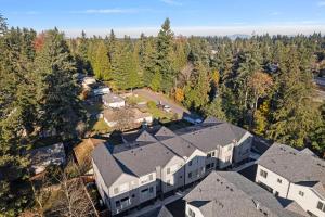 an aerial view of a house in the woods at New Meridian Park Shoreline WA in Shoreline