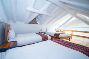 Cama o camas de una habitación en Inkarri Cusco