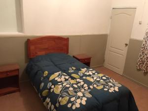 Ένα ή περισσότερα κρεβάτια σε δωμάτιο στο Departamento Central 2 habitaciones